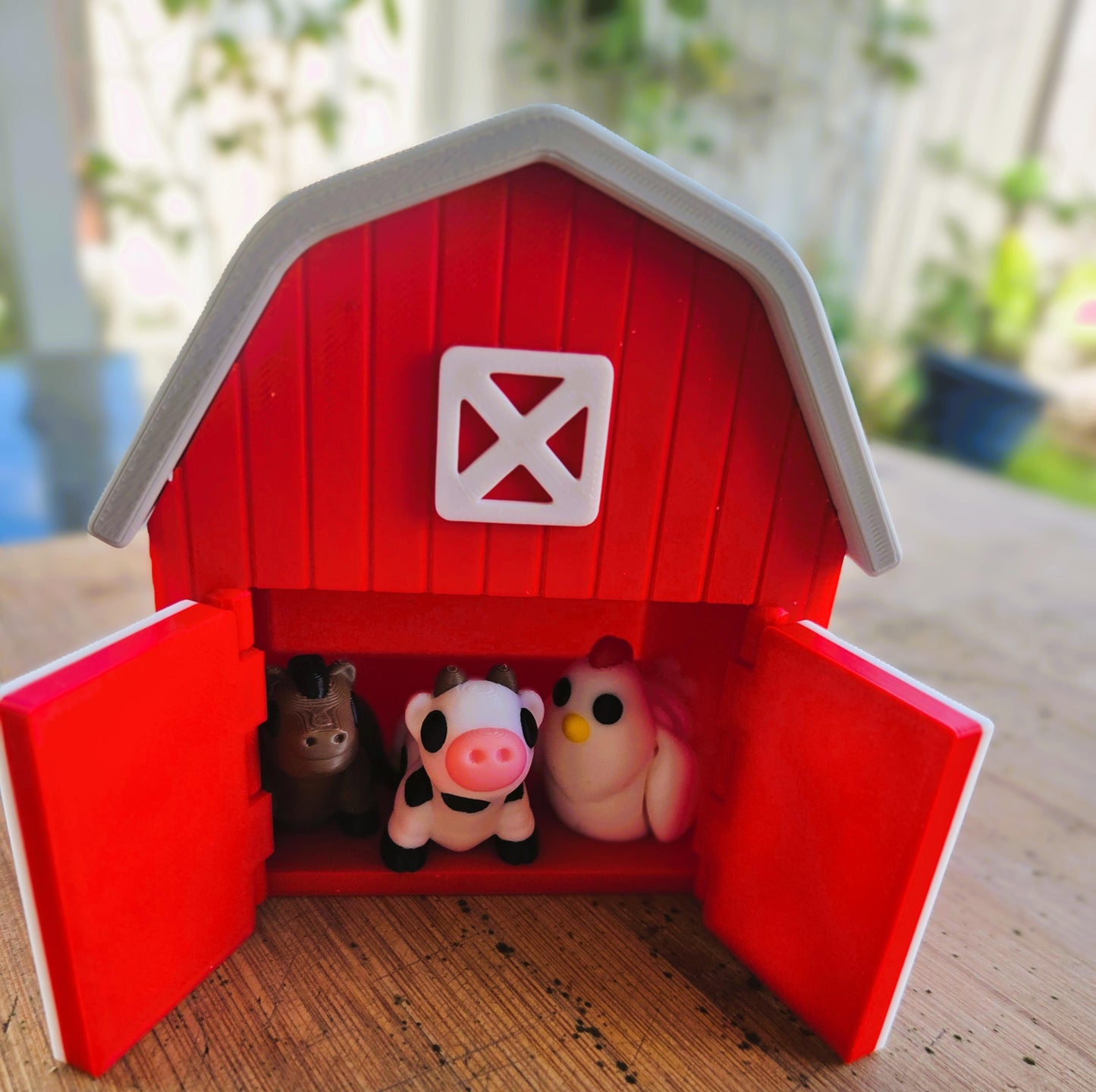 Red toy farmyard barn with a cow, horse, and chicken for childrens creative play. 3d printed in Australia by Chaos 3D Printing.