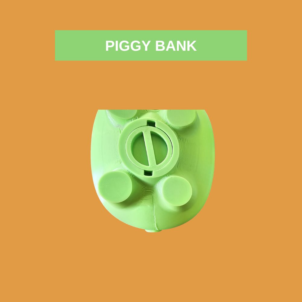 Green piggy bank with large google eyes . Fun piggy bank for young or old.