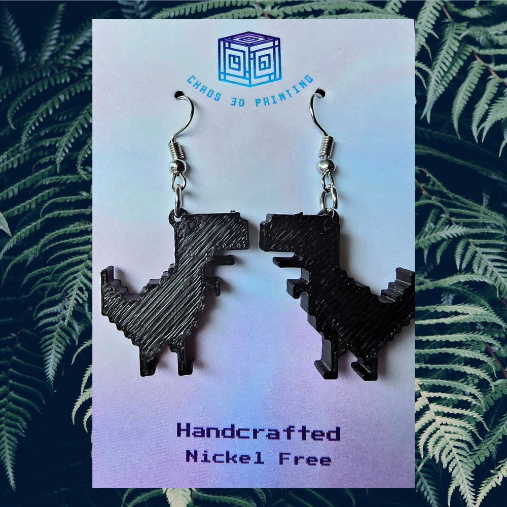 3D printed T-Rex Dinosaur earrings. Nickel free hooks for sensitive ears. Chaos 3D Printing has a range of gifts for men and women.