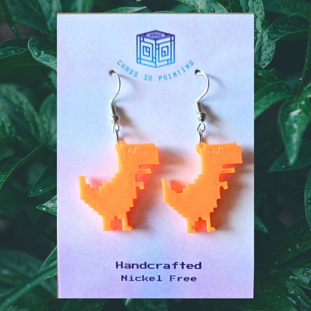 Cut Mini TRex dinosaur earrings. Orange earrings. Nickel free earrings.