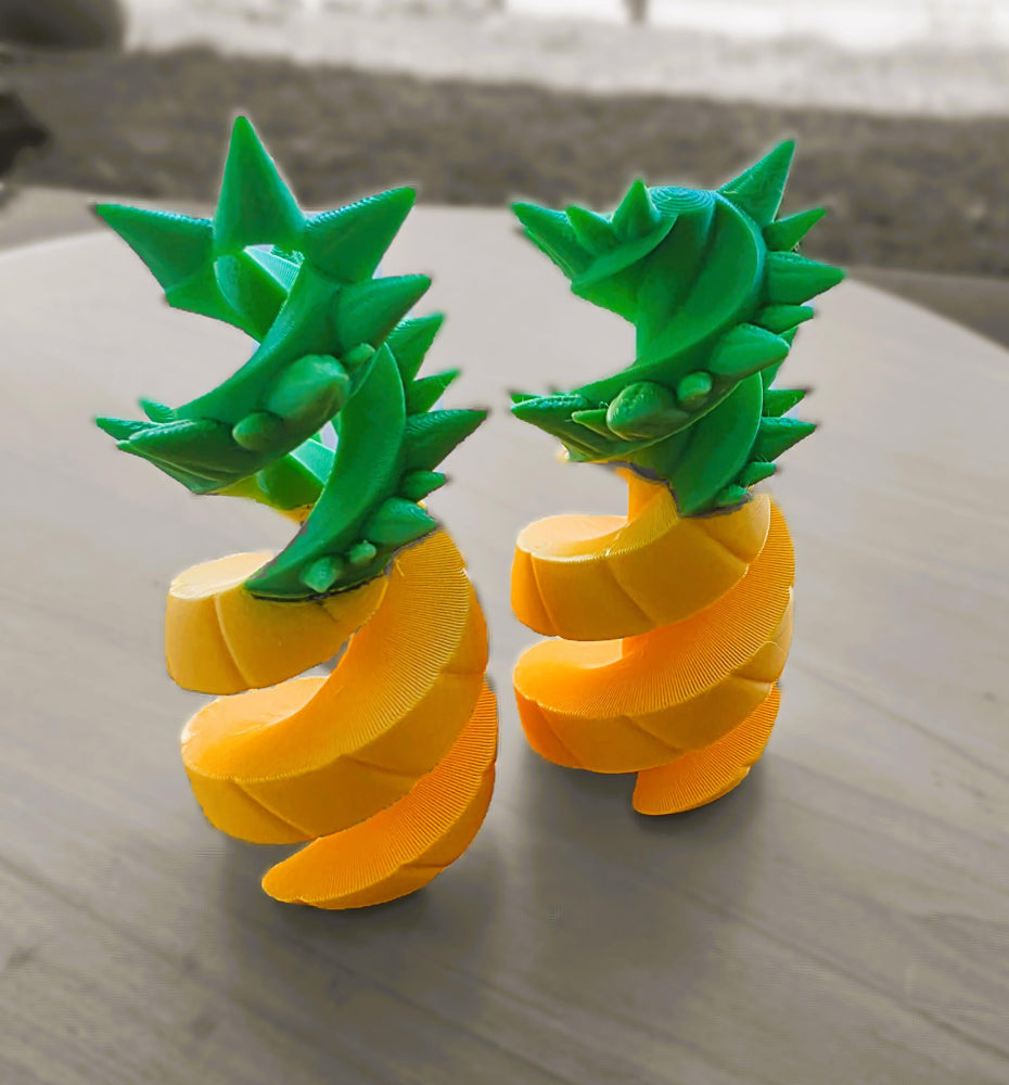 Pineapple-shaped container that spirals apart. 3D printed pineapple fidget toy thats made in Australian by Chaos 3D Printing.