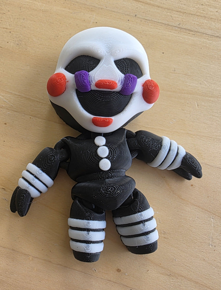 3D Fidget Toy figure with a black, white, and red design. Australian made by Chaos 3D Printing.