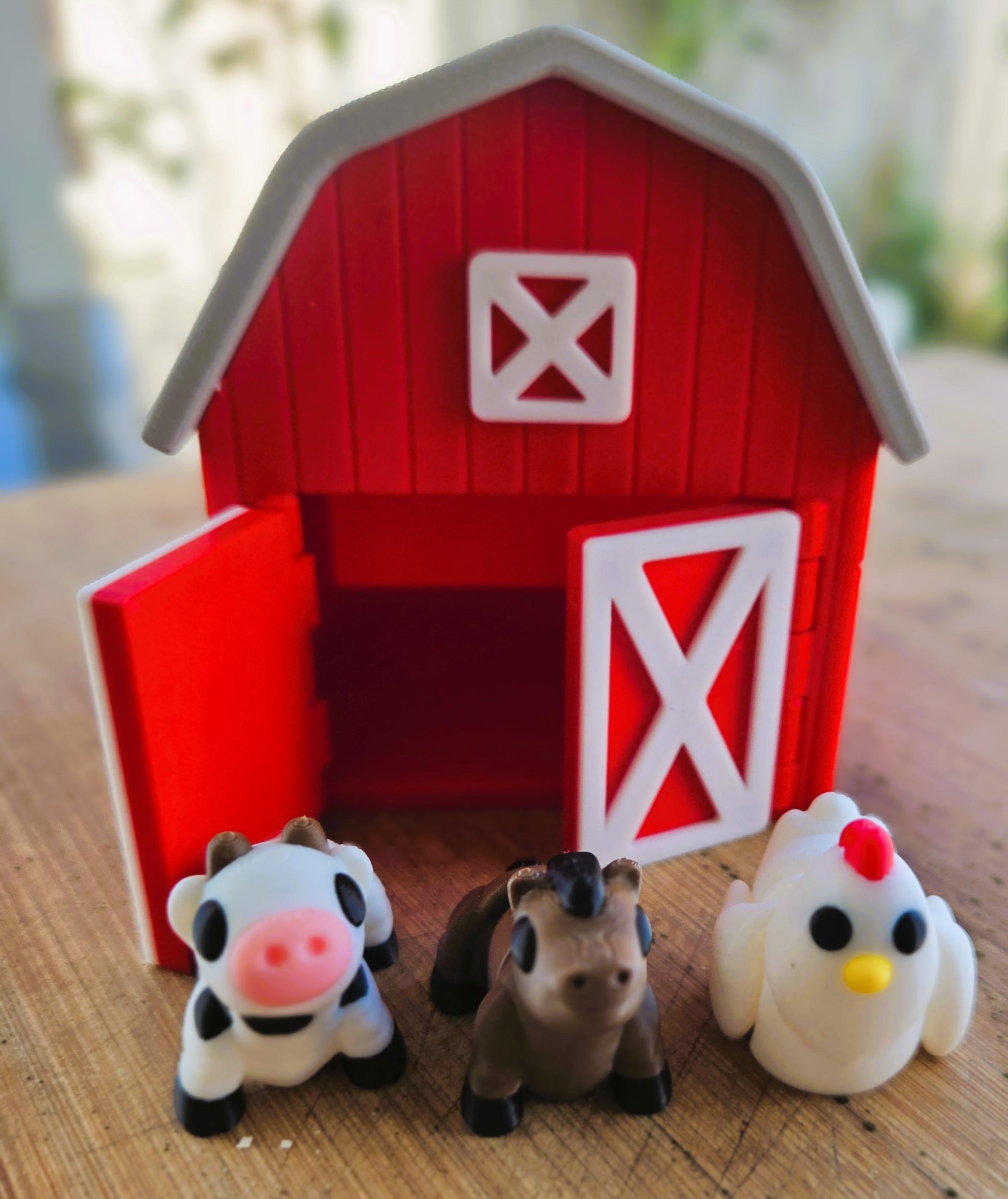 Red toy farmyard barn with a cow, horse, and chicken for childrens creative play. 3d printed in Australia by Chaos 3D Printing.