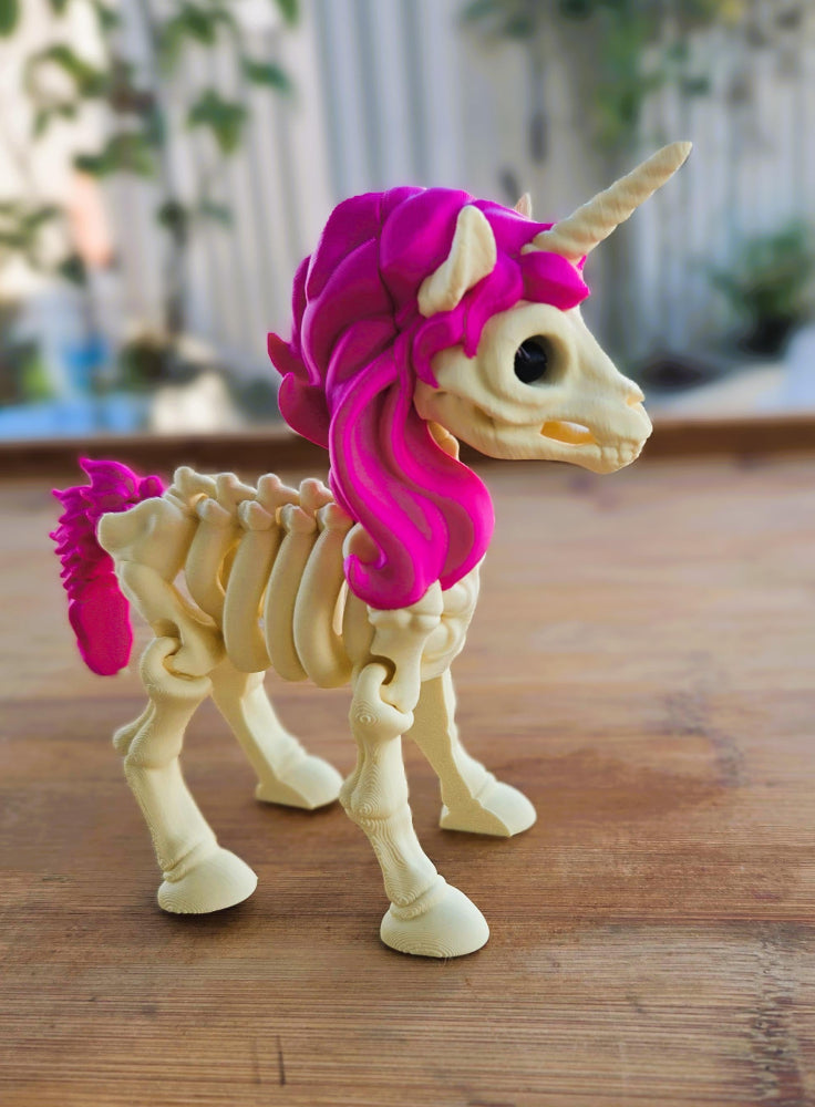 Unicorn skeleton toy with pink hair. Made in Australia by Chaos 3D Printing. Quality 3d printing.