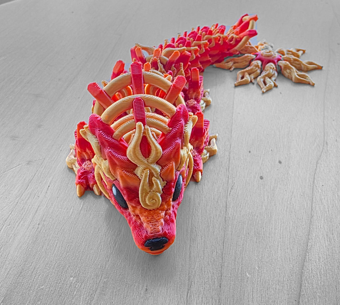 Solar Dragon 3d articulated toy made by Chaos 3D Printing in Australia. Colourful and pretty dragon toy.