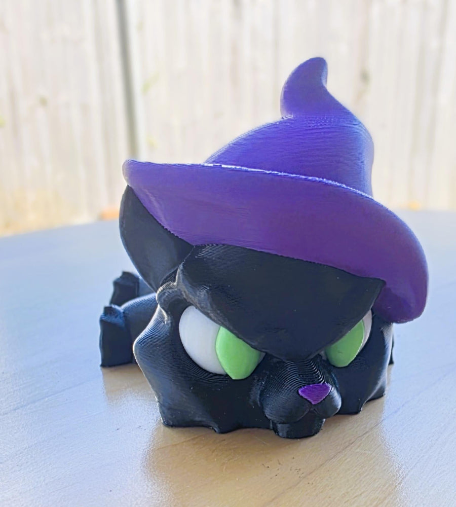 Witchy black cat 3D toy with a purple witch hat. Made in Australia by Chaos 3D Printing.